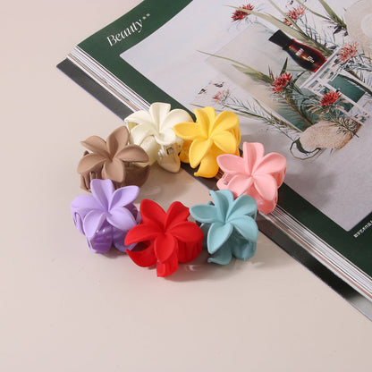 Feather & Red Plastic Flowers Barrettes